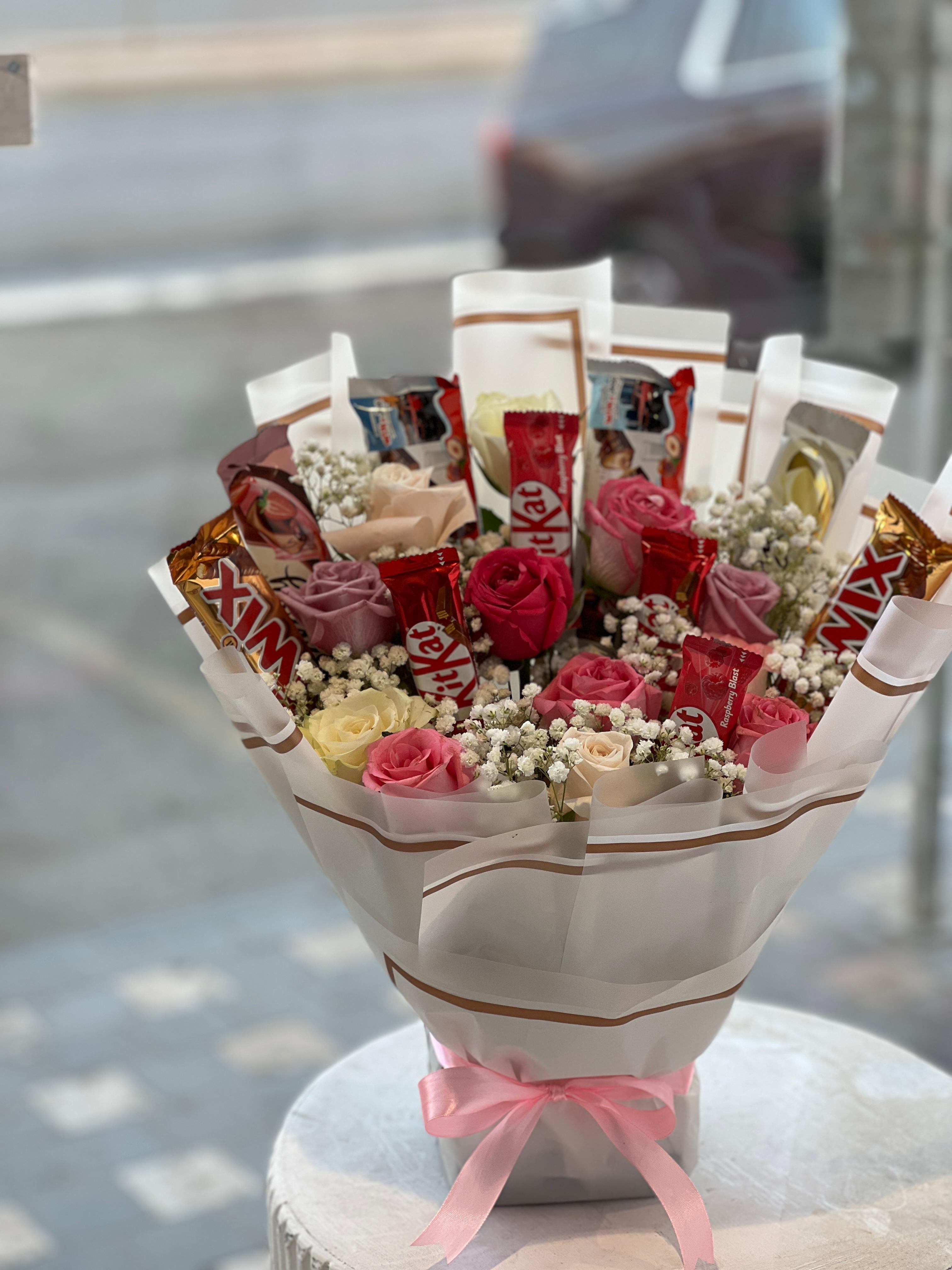 Chocolates in flowers bouquet