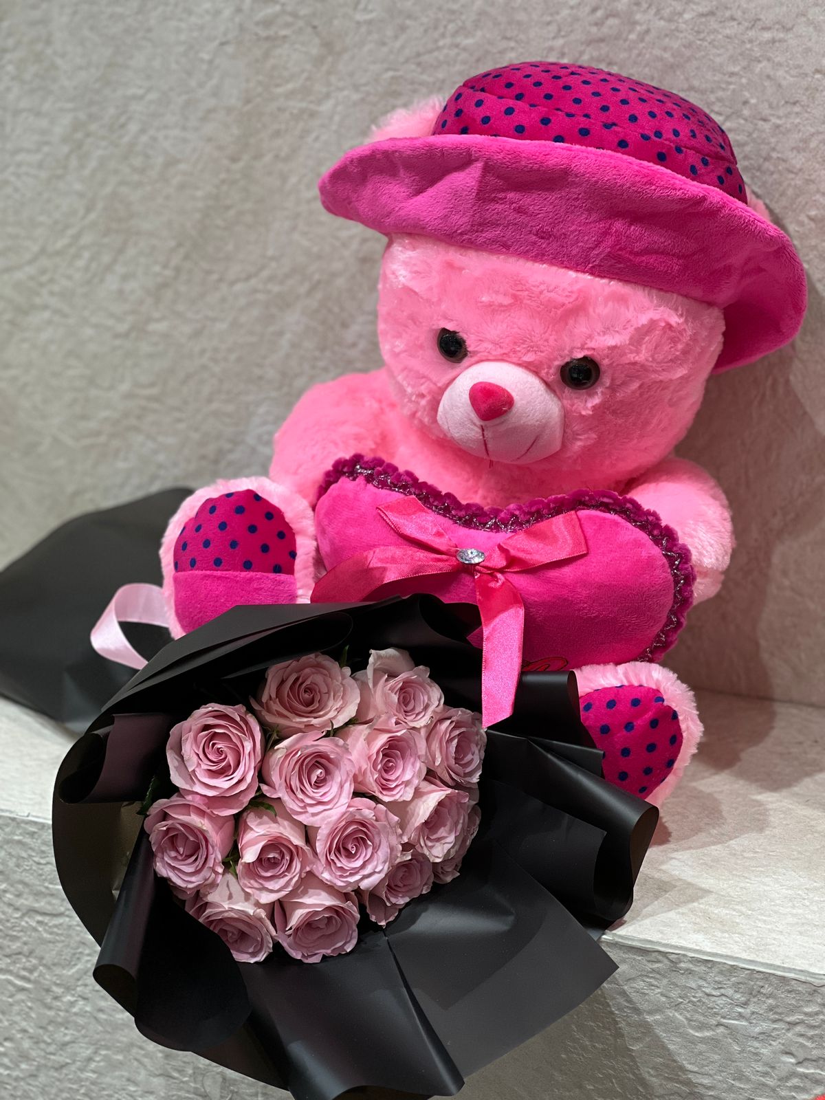 Teddy with hand bouquet