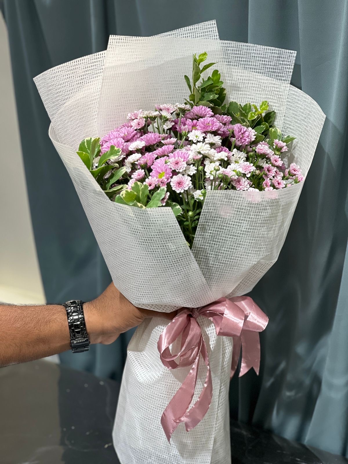 Purple and white baby craze hand bouquet
