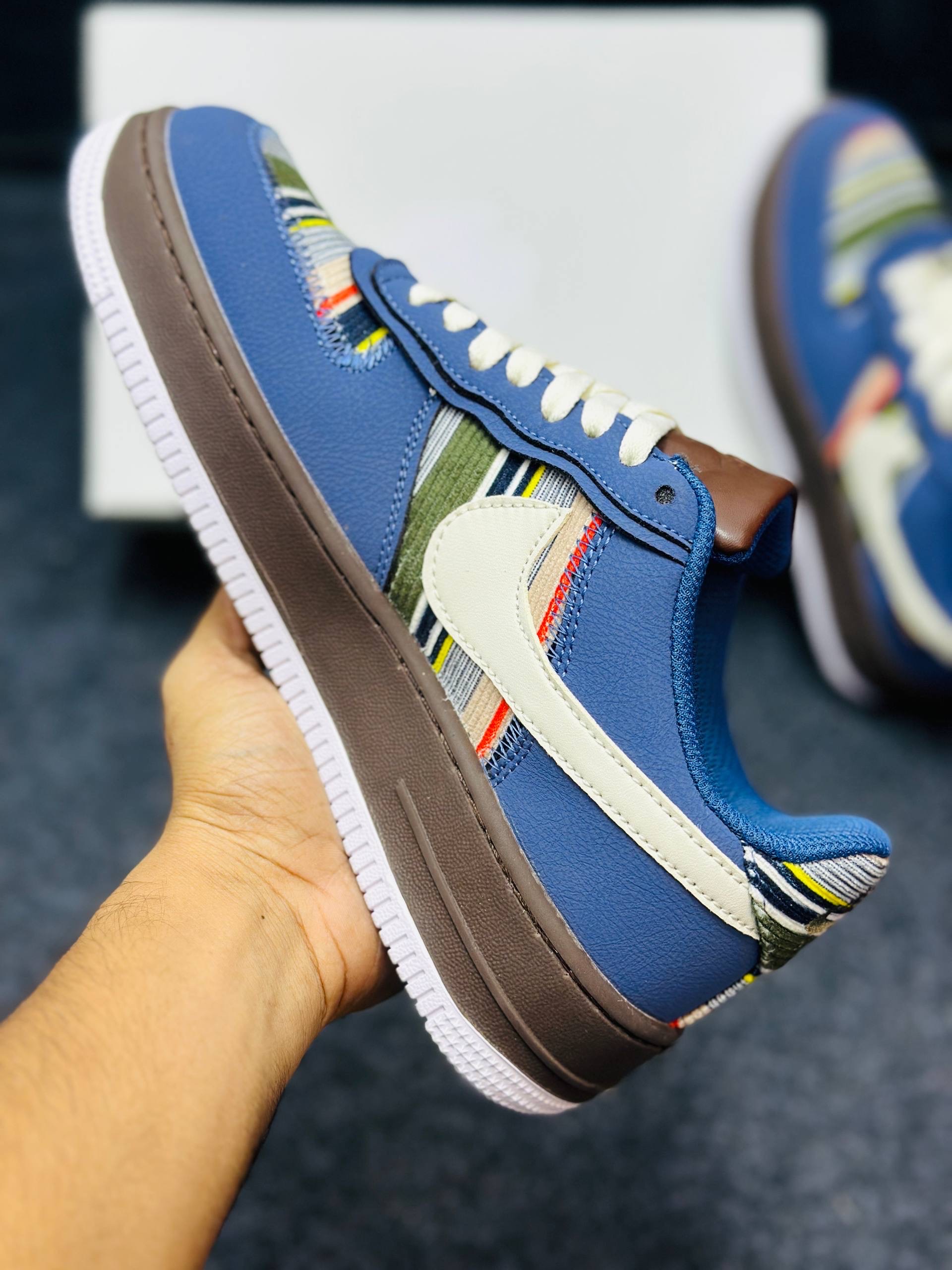 Nike Air Force 1 low: "blue upper, brown midsole, and a multicolor striped textile panel" (1:1) thumbnail 3