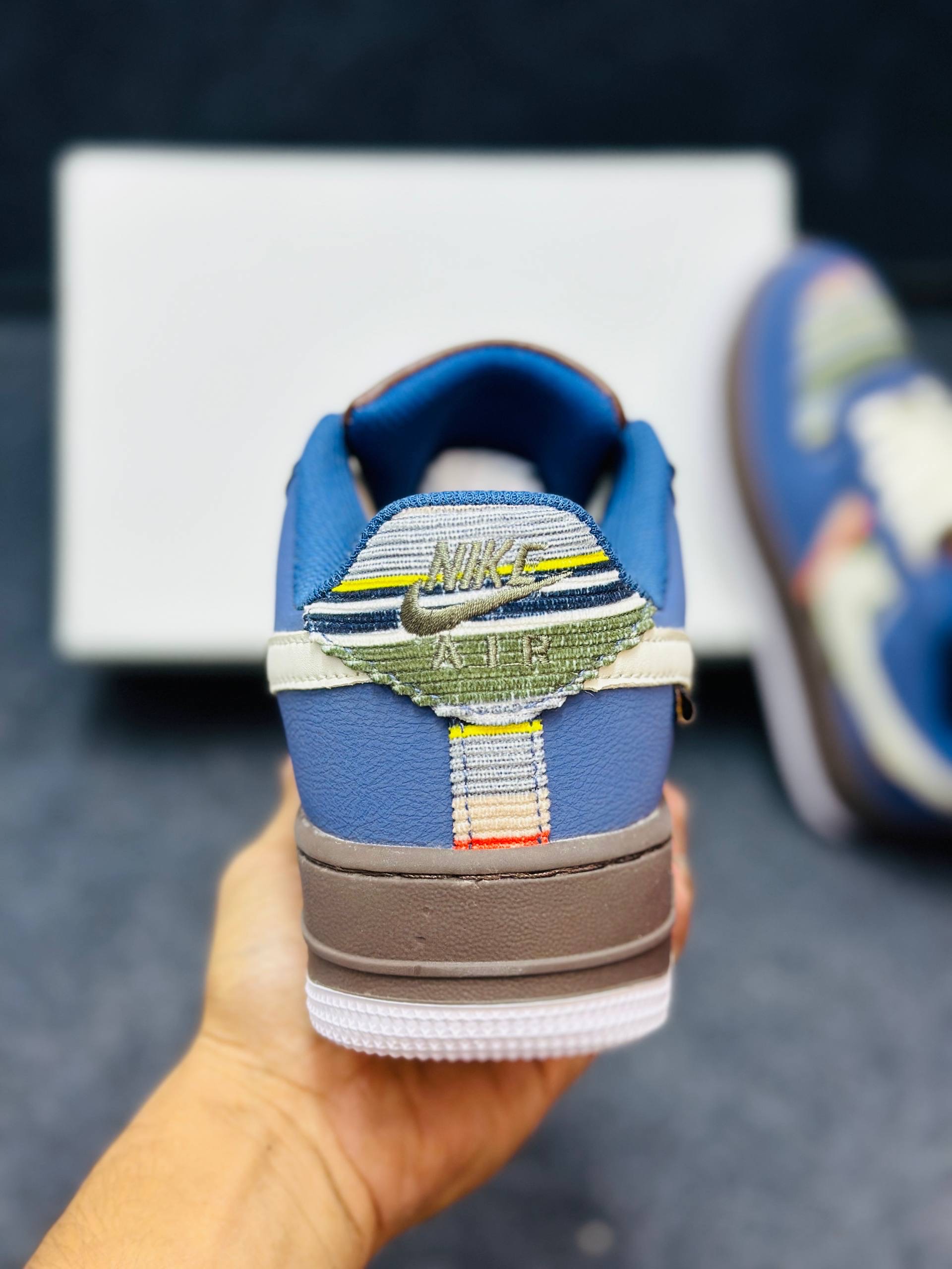 Nike Air Force 1 low: "blue upper, brown midsole, and a multicolor striped textile panel" (1:1) thumbnail 4