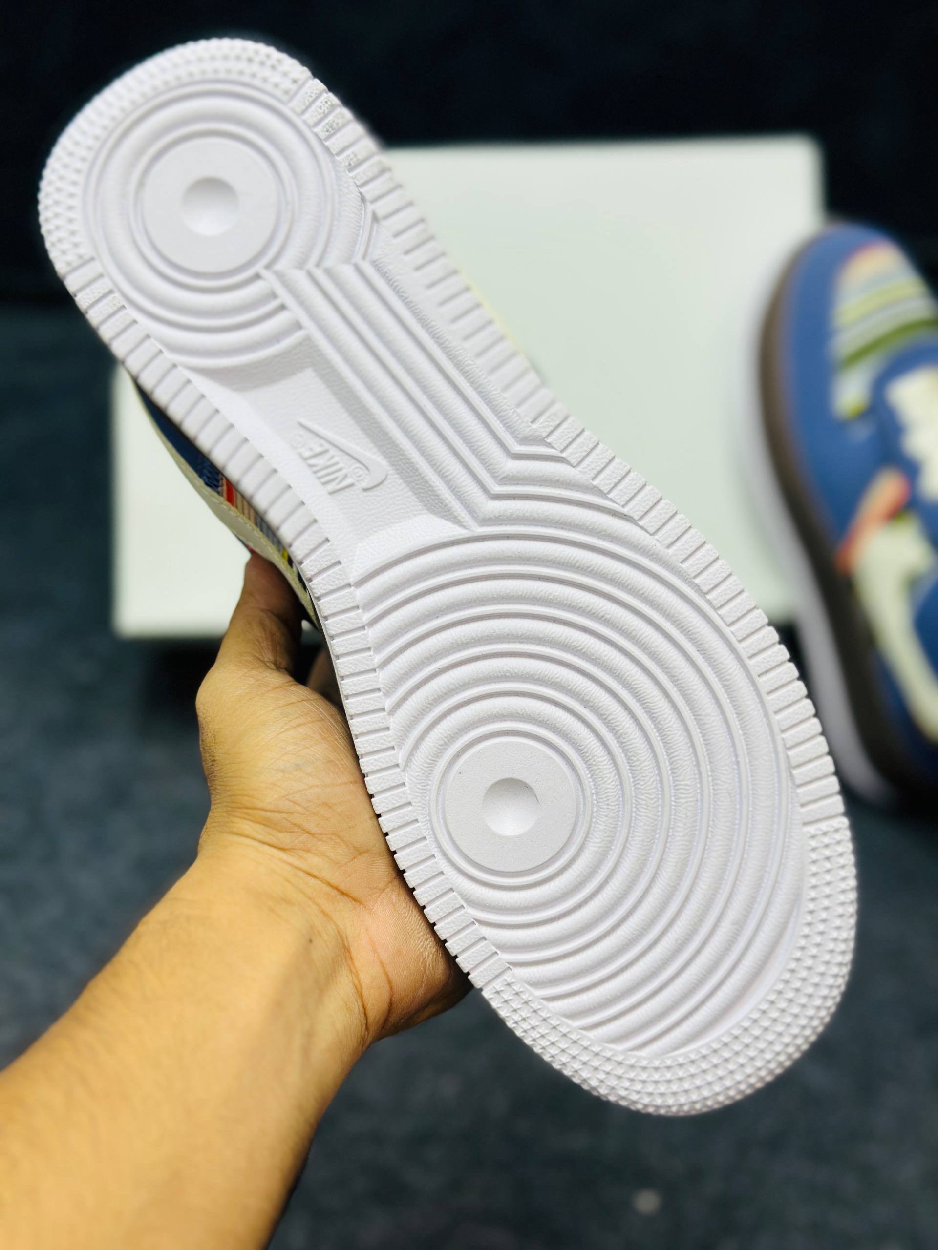 Nike Air Force 1 low: "blue upper, brown midsole, and a multicolor striped textile panel" (1:1) thumbnail 5