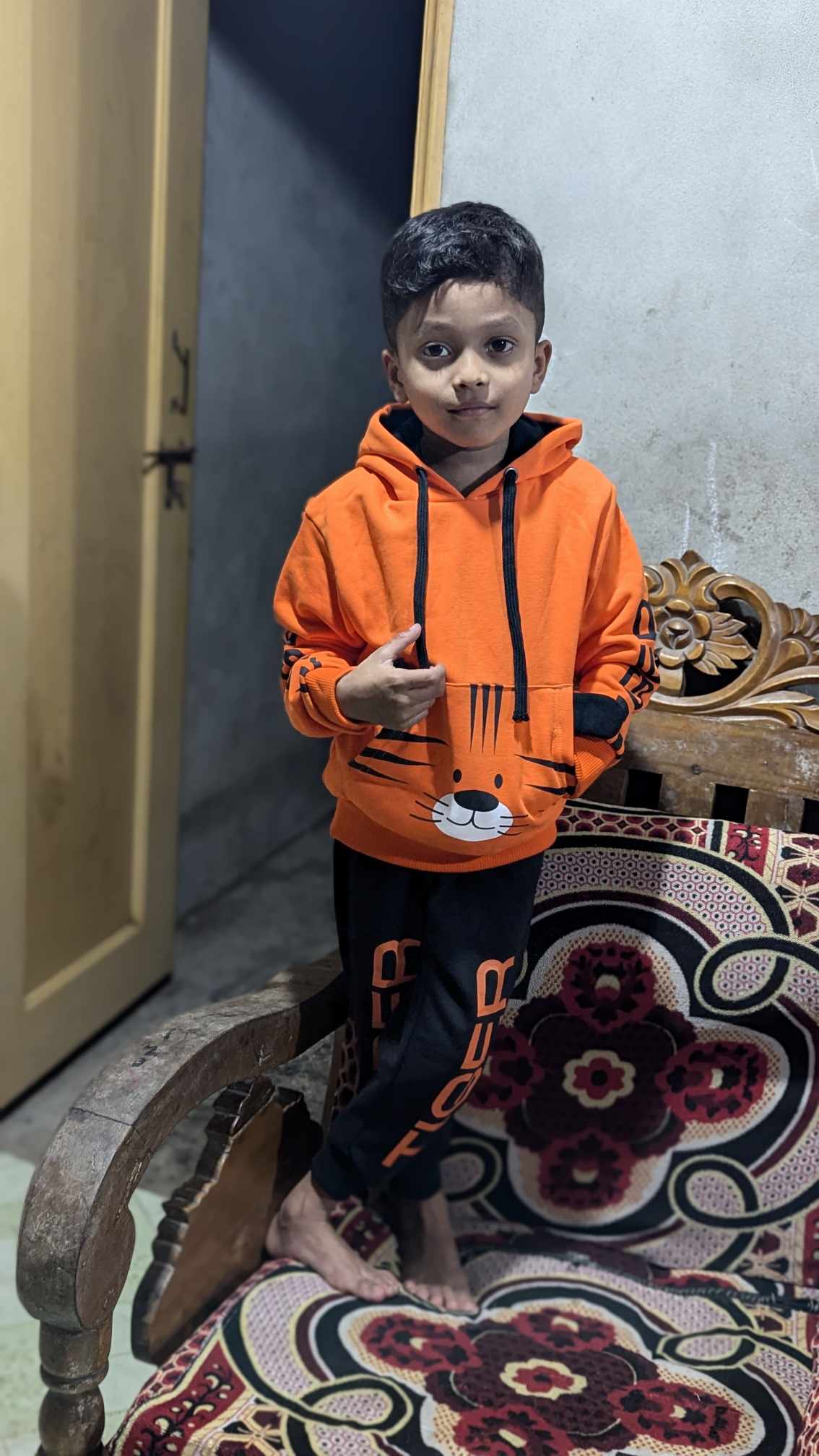 Hoodie and trousers (Orange colour hoadies and Black trouser)_img_2
