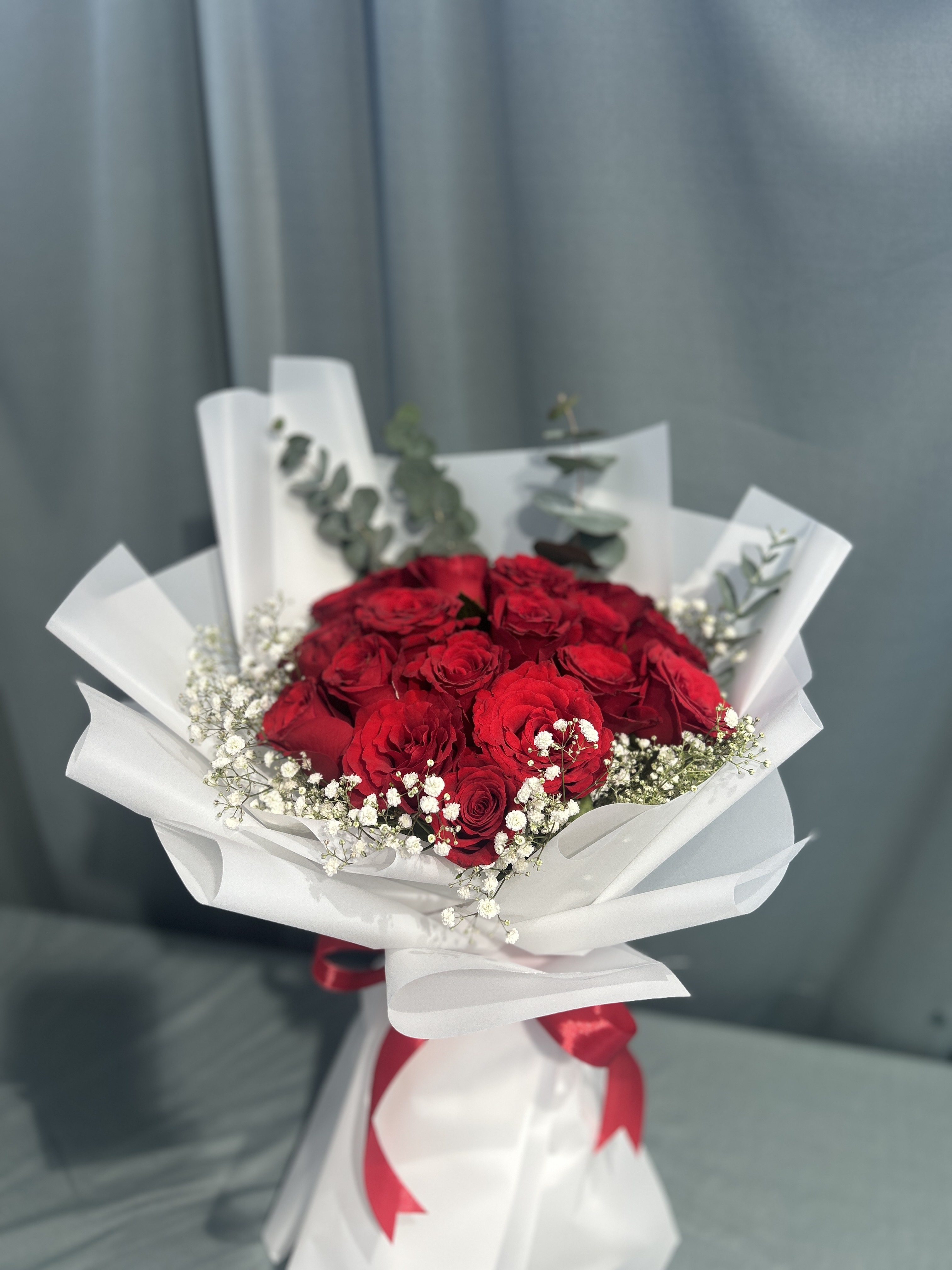 Red and white hand bouquet