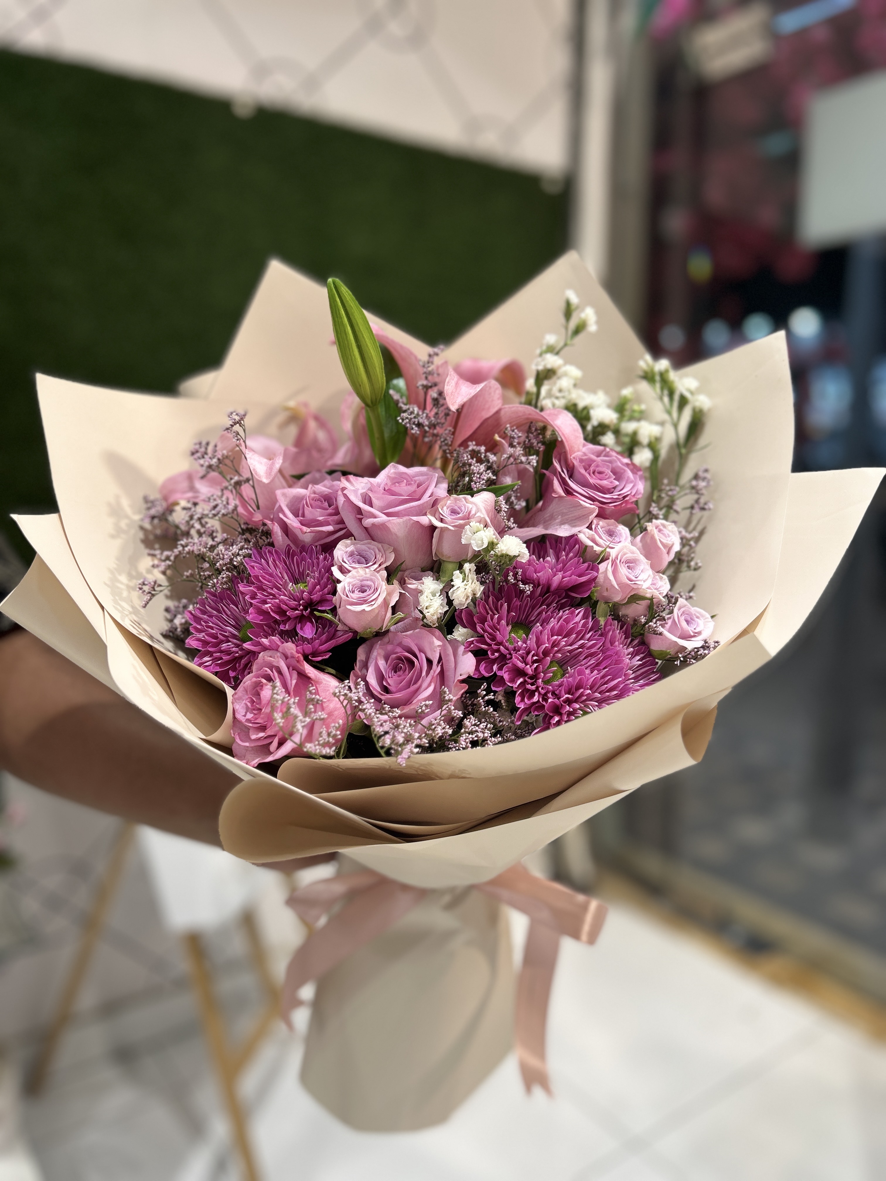Purple multiple types flowers hand bouquet