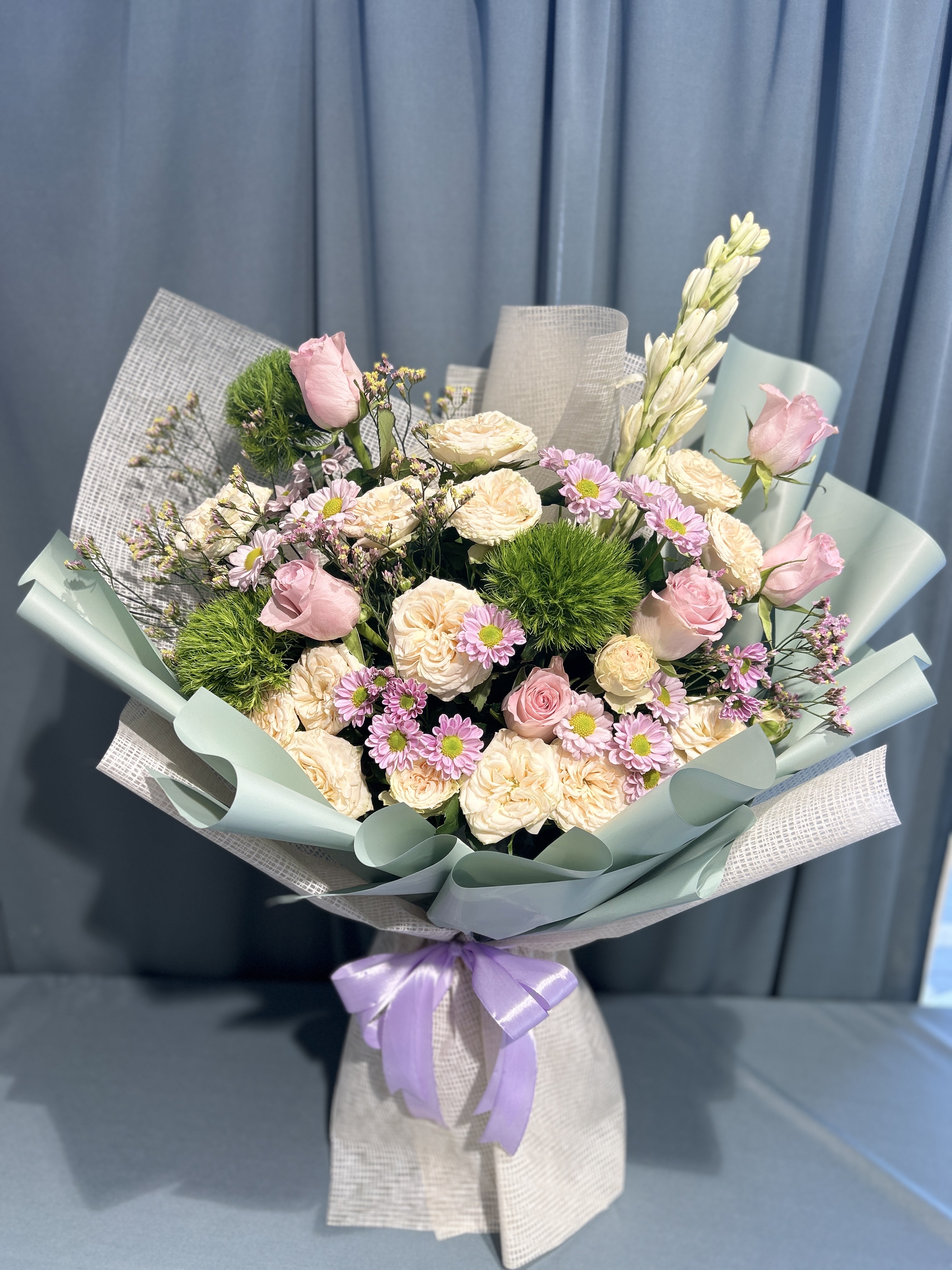 Purple with of white stunning bouquet