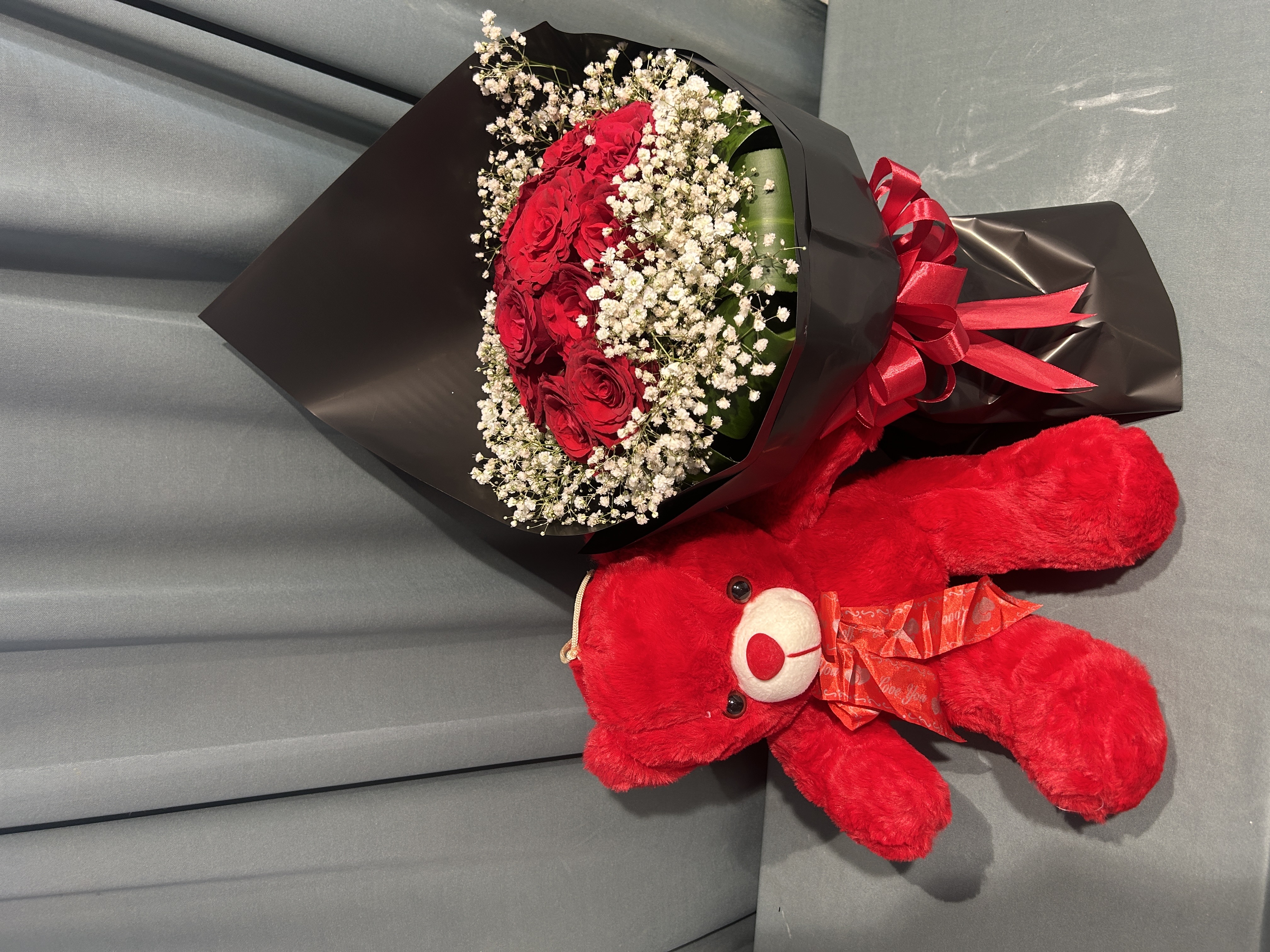 Red Teddy with red roses hand bouquet