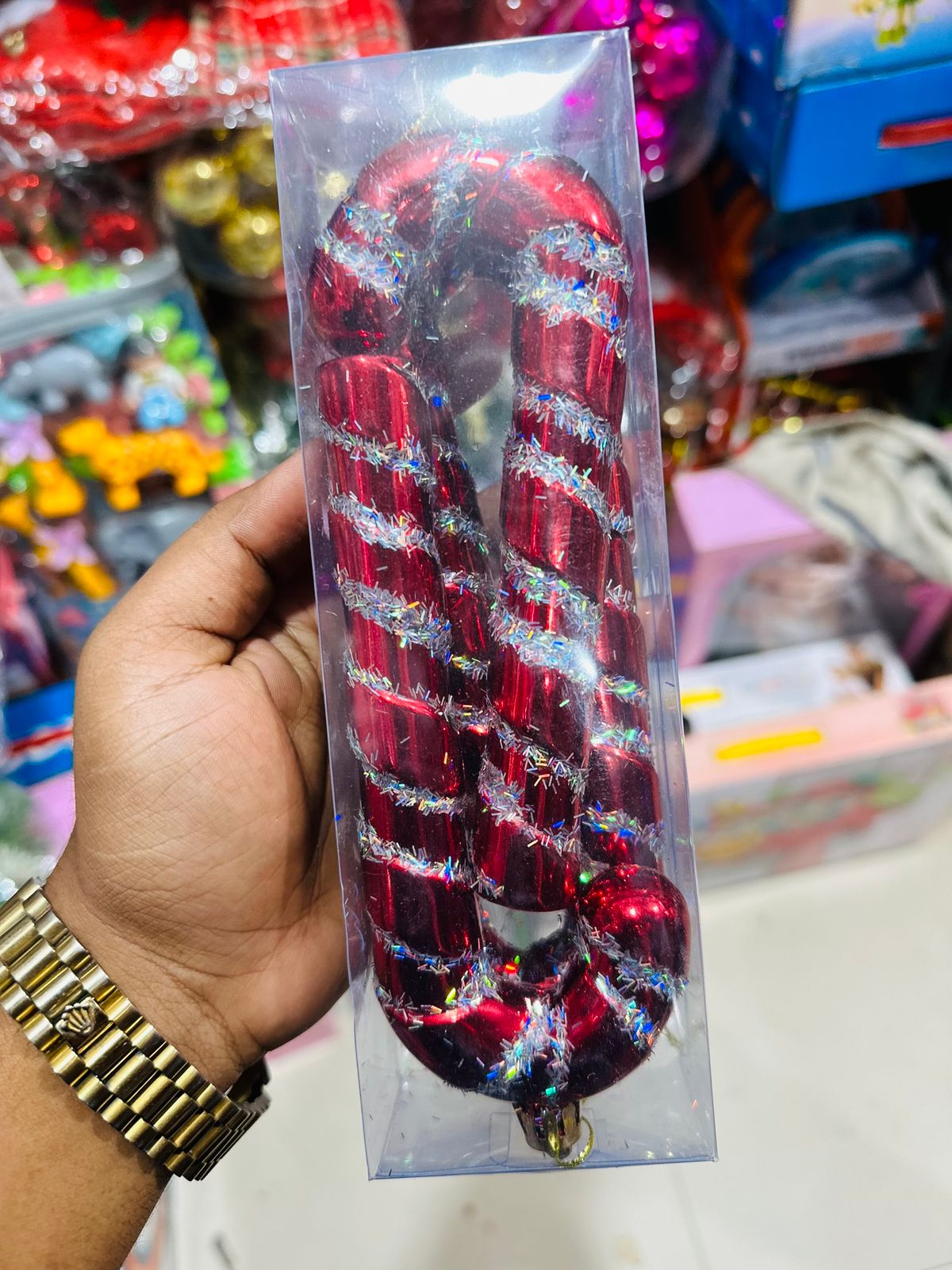 glittering red candy cane Christmas ornament