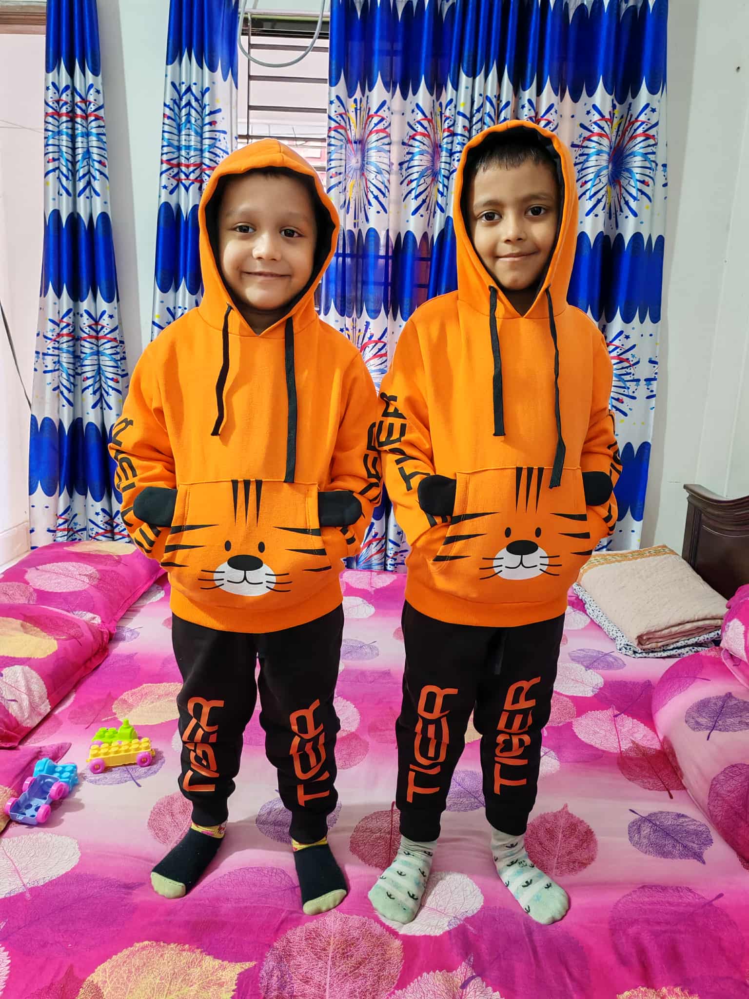 Hoodie and trousers (Orange colour hoadies and Black trouser)_img_3