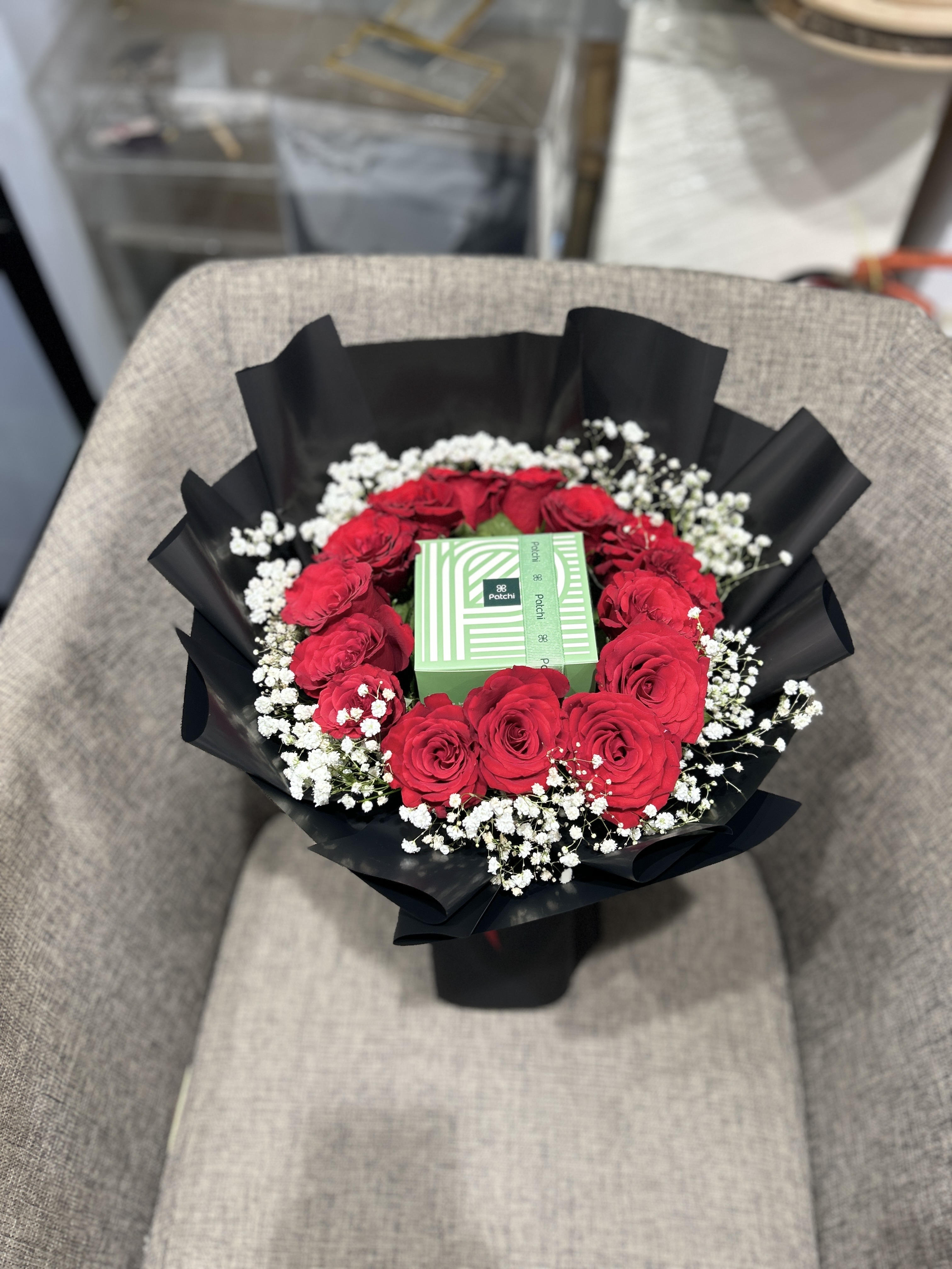 chocolates within Red flowers
