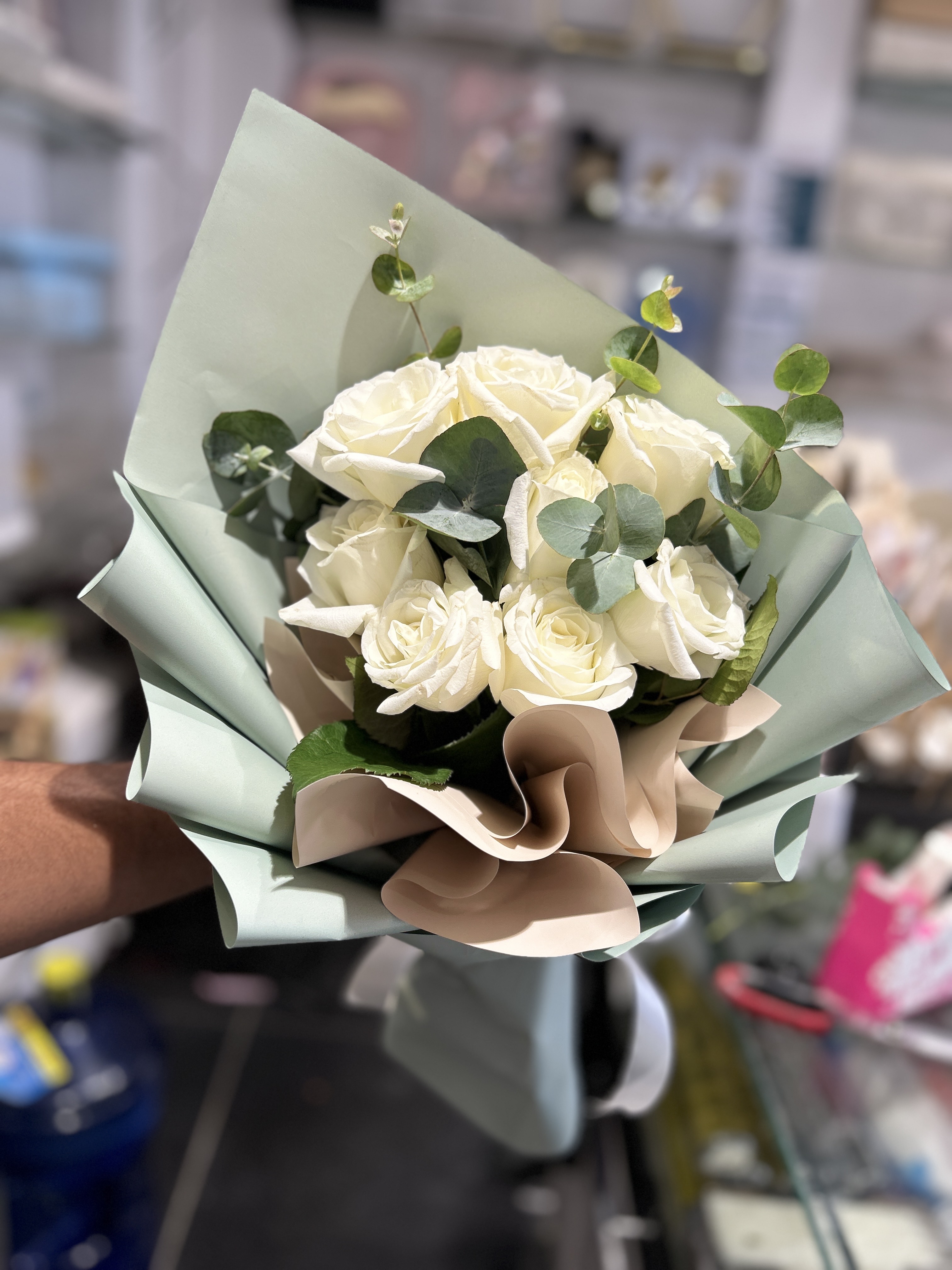 White and green small hand bouquet