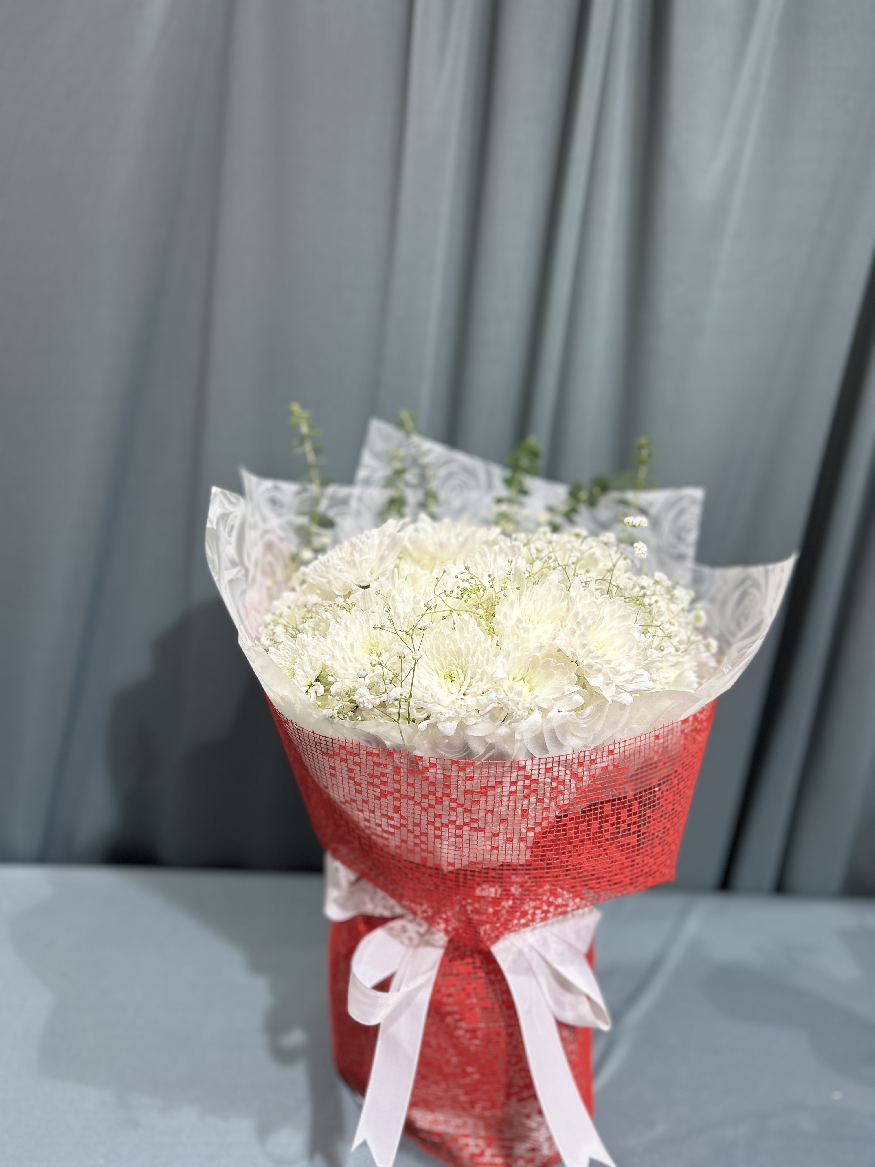 White Chrysanthemum flowers hand bouquet
