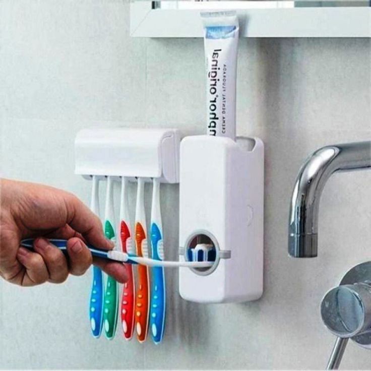 Autocratic toothpaste dispenser brash holder